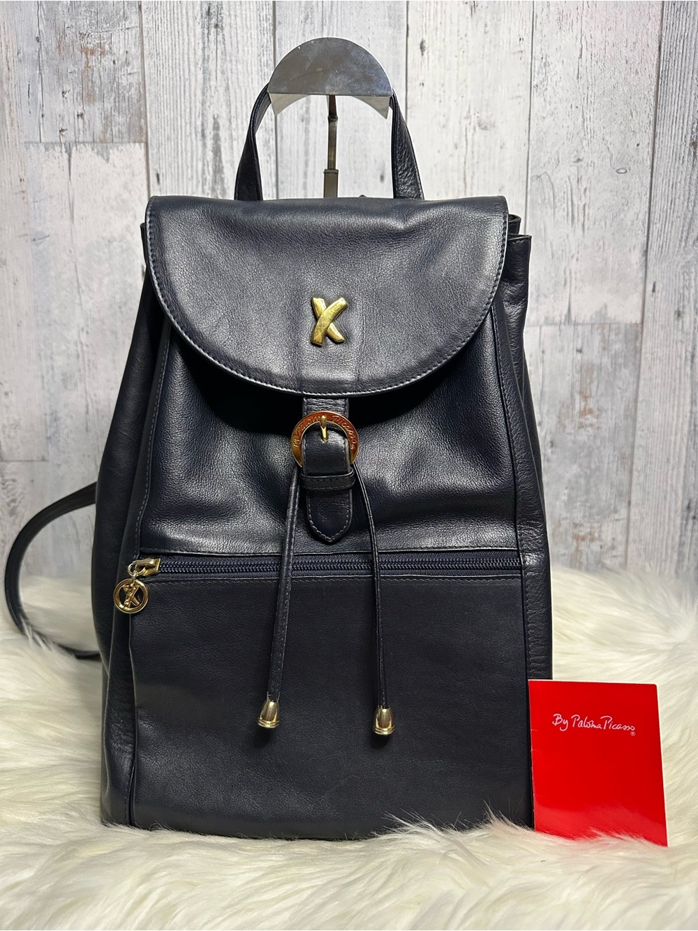 Paloma Picasso Black Leather Drawstring Backpack with Gold Accents
